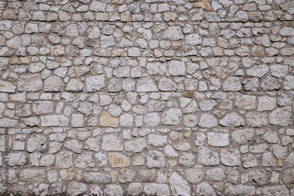 Wall texture made of rocks of different sizes