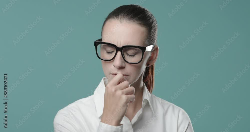 Worried pensive woman thinking with hand on chin