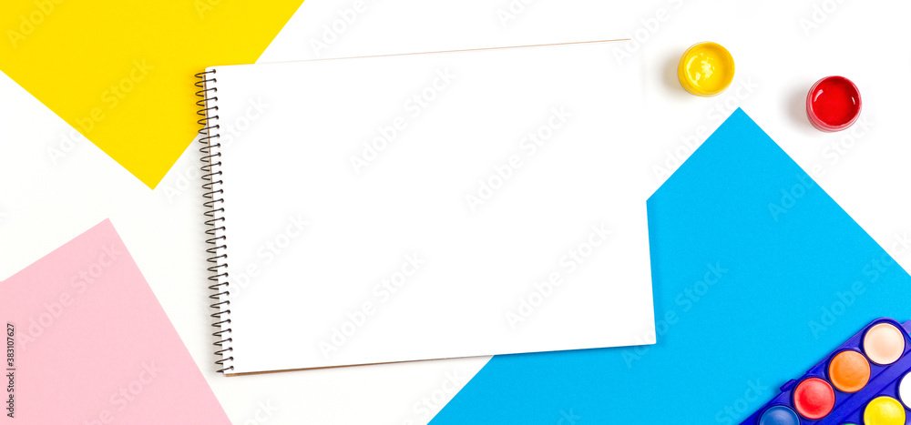Learning, hobby, art banner background. Empty sketchbook with art supplies around. Mockup. Top view, flat lay Learning, hobby, art banner background. Empty sketchbook with art supplies around. Mockup. Top view, flat lay