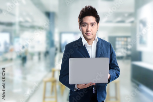 smart businessman in business suite grap computer laptop