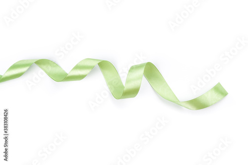 green satin curly ribbon isolated on white background