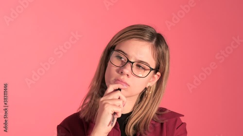 Woman In Glasses Thinking In Studio Setup