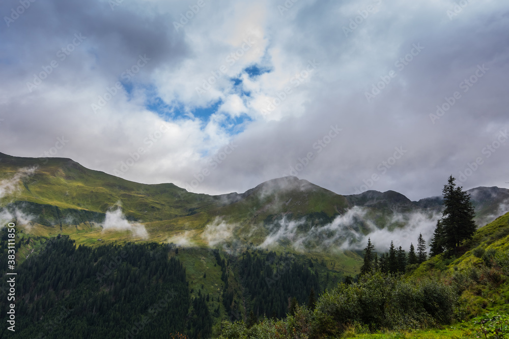 fine white fog in the mountains while hiking