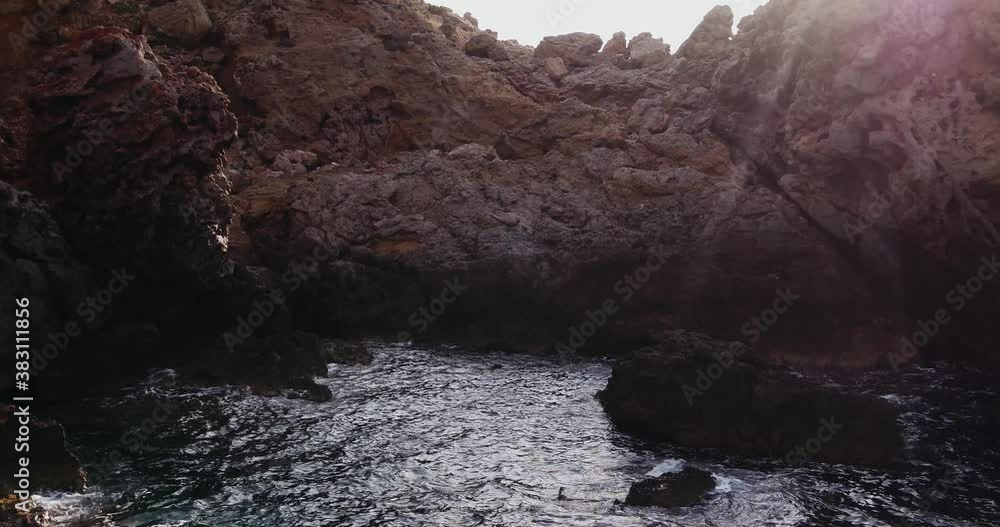 Ibiza coastline, Balearic Islands, Cala Tarida cliffs and beach, stunning aerial footage of the mediterranean sea Ibiza coastline, Balearic Islands, Cala Tarida cliffs and beach, stunning aerial footage of the mediterranean sea