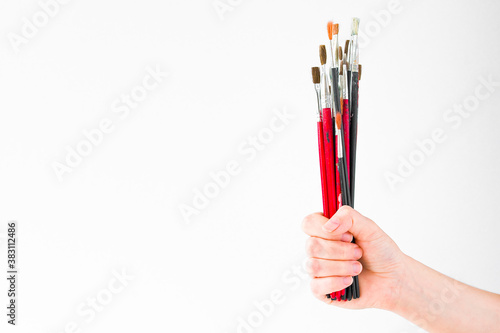 hand with paintbrush isolated