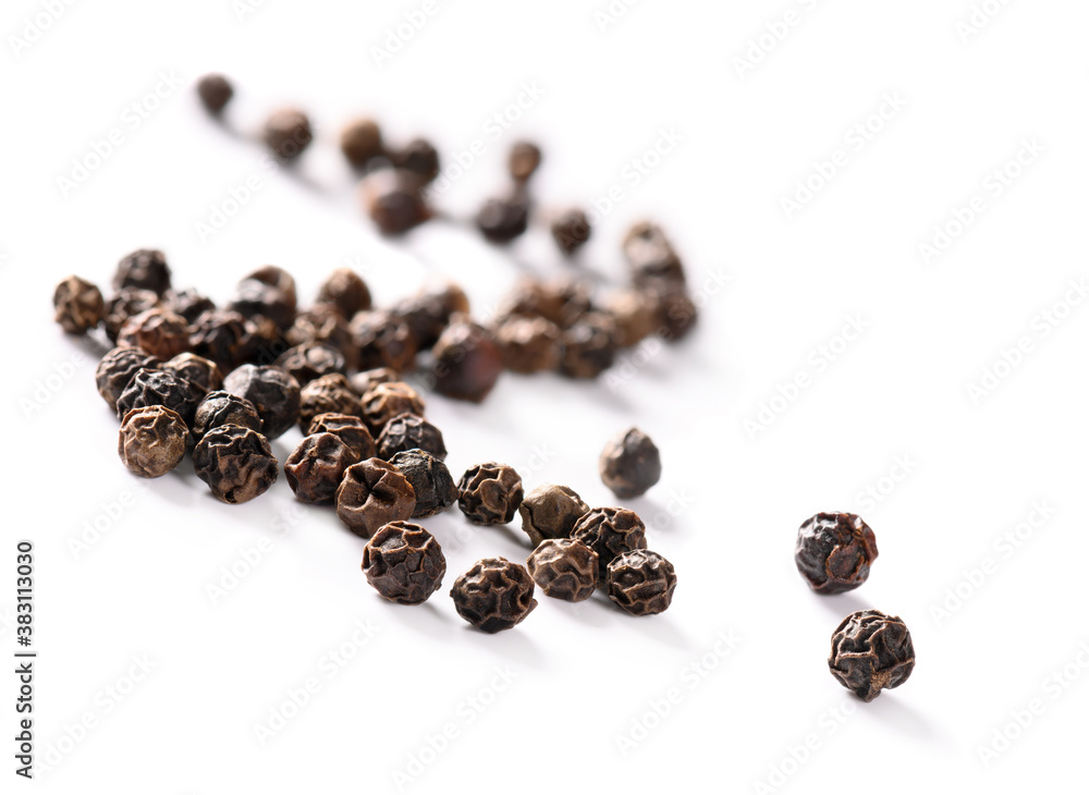 Black pepper corns isolated on white background. Black pepper corns isolated on white background.