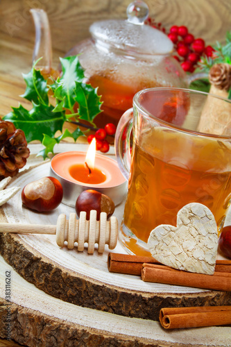 Tea time cup and cinnamon with heart photo