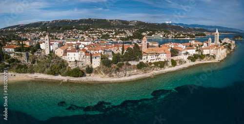 Fototapeta Naklejka Na Ścianę i Meble -  Aerial panorama picture of Rab city on the Rab Island, Croatia. Scenic view of Rab city surrounded by sea.