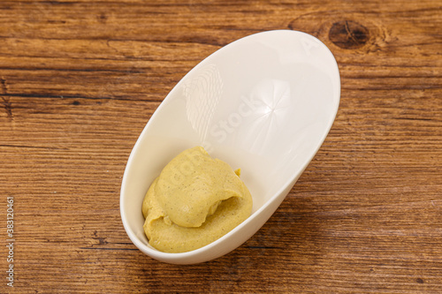 Dijon mustard sauce in the bowl