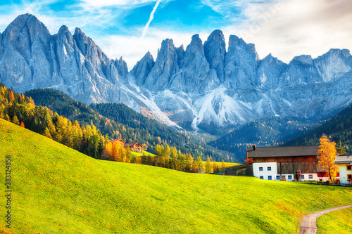 Colorful autumn scene of magnificent Santa Maddalena village in Dolomites