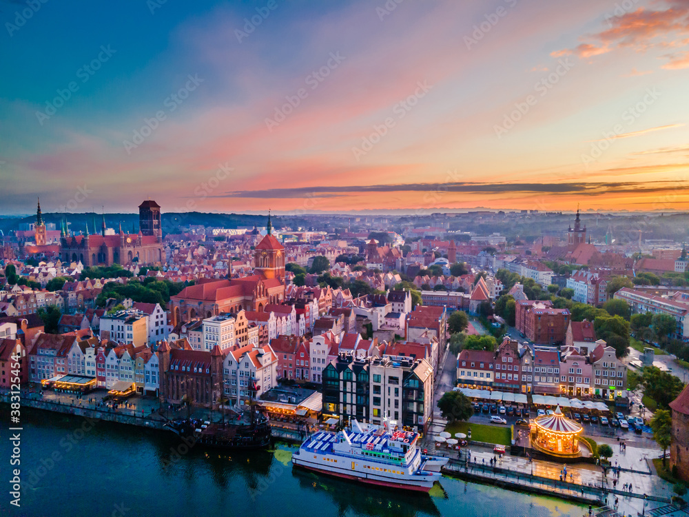 Aerial sunset view of the amazing old town and rivers of Gdansk with ships