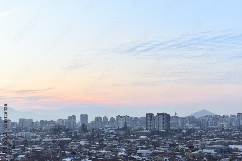 Santiago de Chile sunset. A beautiful panoramic view of the skyline, moderns and classics buildings of Chile in South America