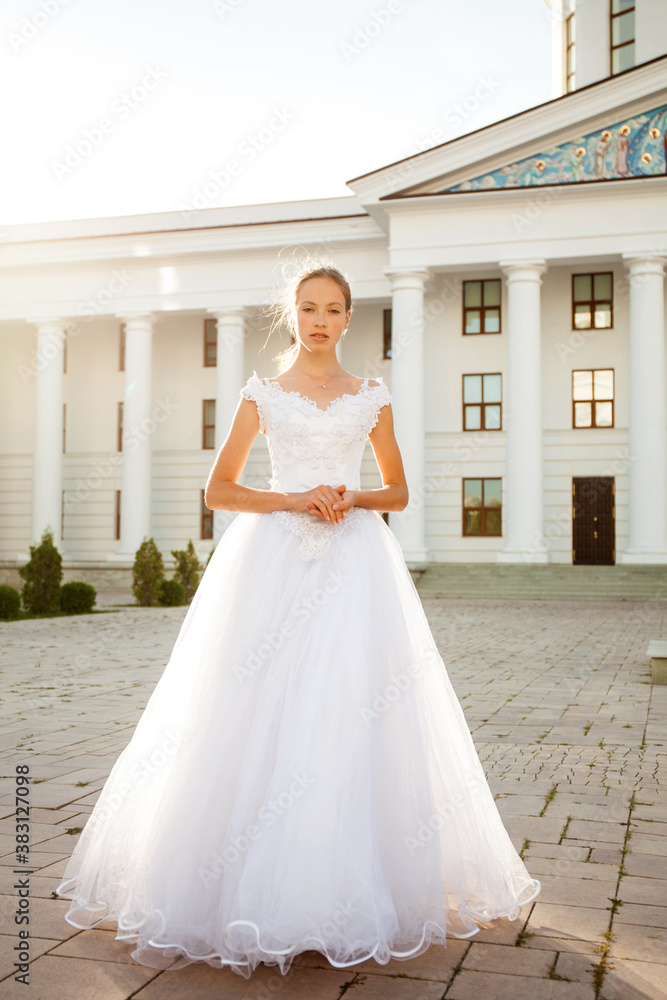 Portrait of a young woman in a white ball gown Portrait of a young woman in a white ball gown