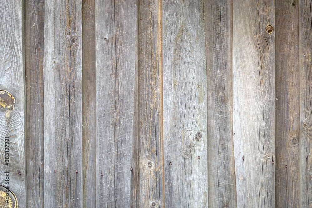 a fence of boards in a grey tone for the background