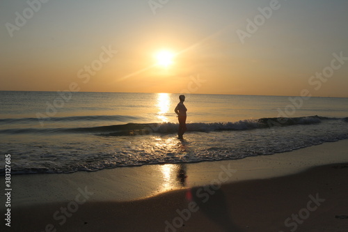 silhouette of a person on the beach