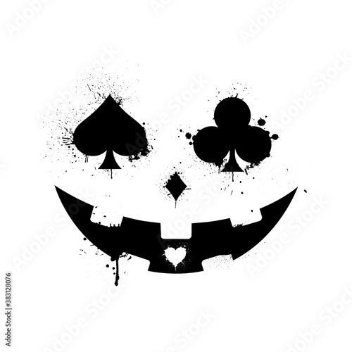 Black scary and horror face of Halloween pumpkin or ghost with poker and casino playing card symbols.