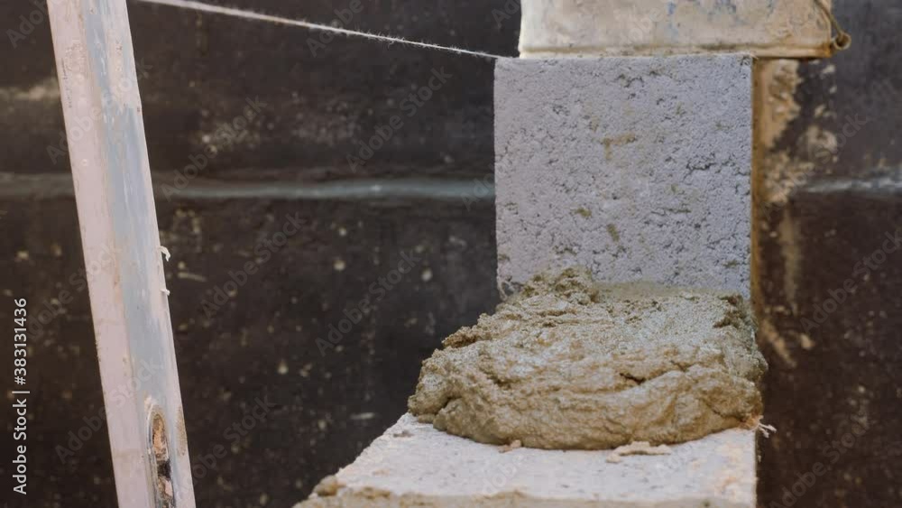 Construction work. Cinder block laying. Work of masons. Construction work. Cinder block laying. Work of masons.