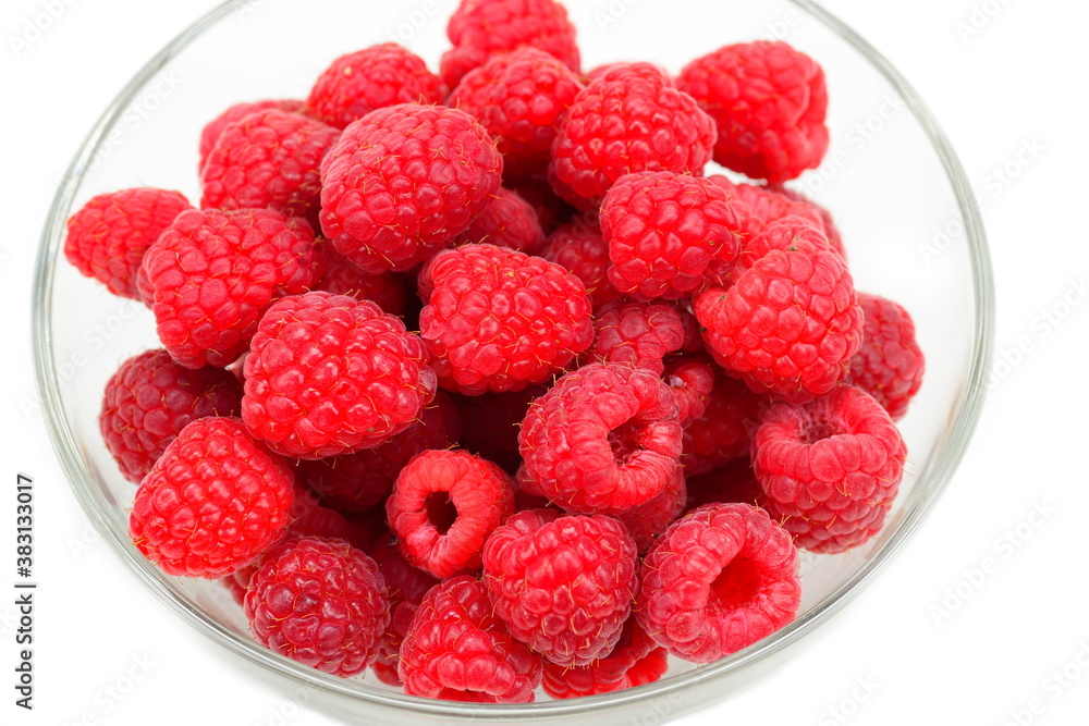 Ripe raspberries on a white background Ripe raspberries on a white background