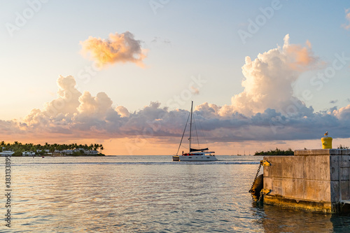 Sunset, view of Sunset y Island from Mallory Square, Key West, Florida, US