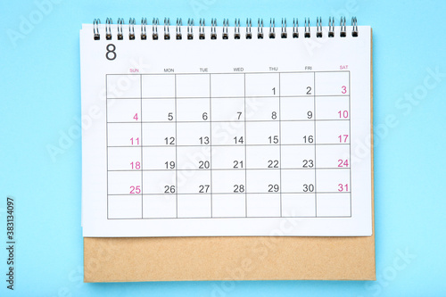 Paper calendar page on blue background © 5second