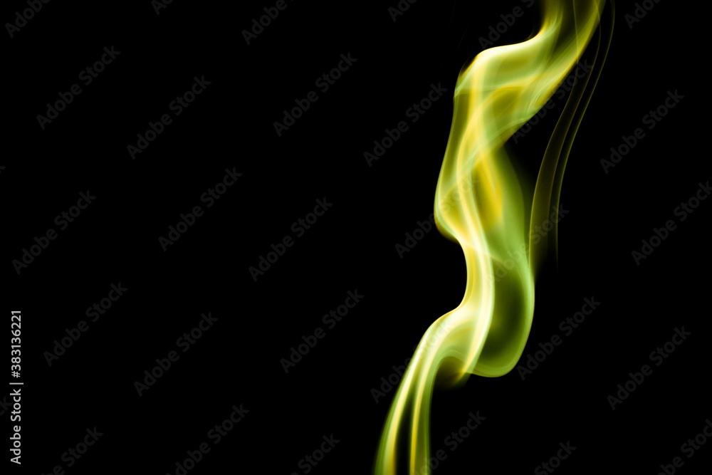 Yellow smoke on black background Yellow smoke on black background