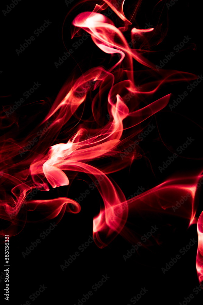 Obraz premium Red smoke on black background