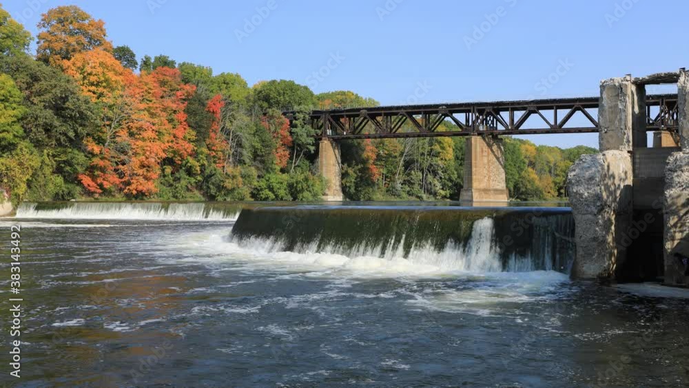 Timelapse of dam and railway bridge in fall, Paris, Canada 4K Timelapse of dam and railway bridge in fall, Paris, Canada 4K