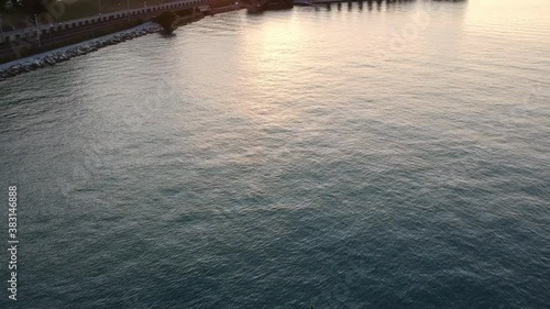 Flight over lake with rowing boat