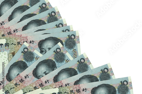 10 Chinese yuan bills lies isolated on white background with copy space stacked in fan close up photo