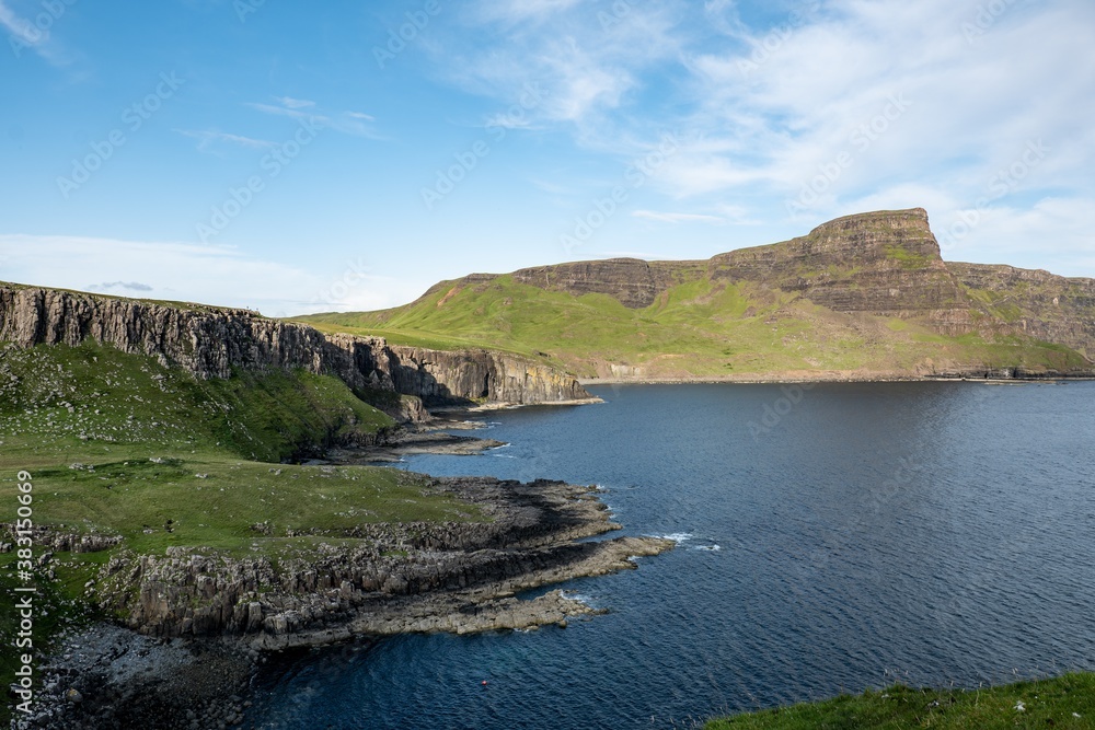 Obraz premium Landscape of Waterstein Head mountain range seen from Neis Point Lighthous at Isle of Skye, Scotland