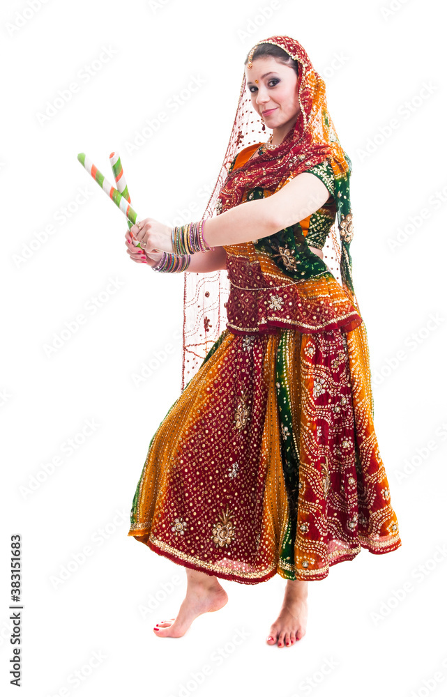 Bollywood dancer in traditional vivid Indian dress in various poses