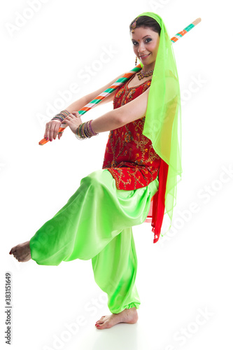 Bollywood dancer in traditional vivid Indian dress in various poses