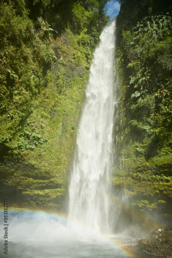 Fototapeta premium Salto las Cascadas falls at Llanguihue lake and Osorno Volcano, Puerto Varas, Chile, South America.