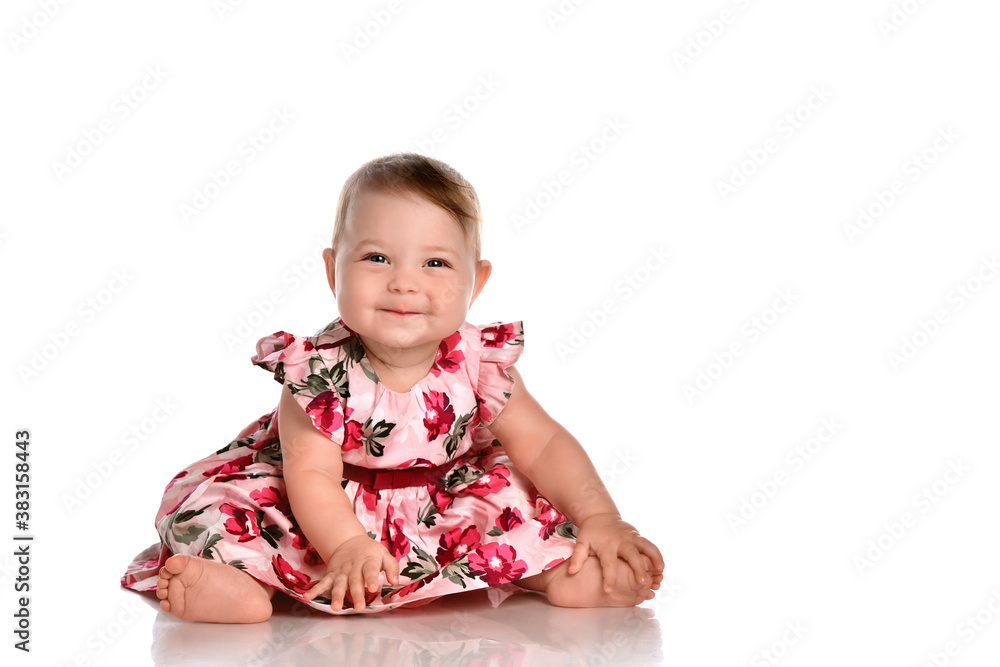 Pretty baby in beautiful dress sitting on floor Pretty baby in beautiful dress sitting on floor