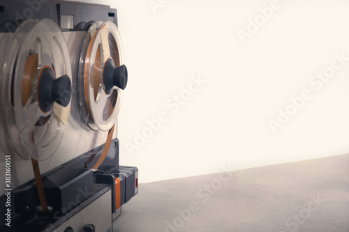 perspective view of old tape recorder with vintage look photo