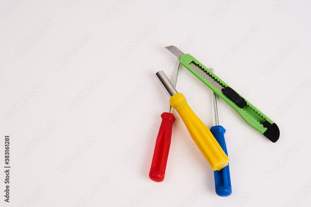 construction tools screwdrivers on a light background equipment for repair industry