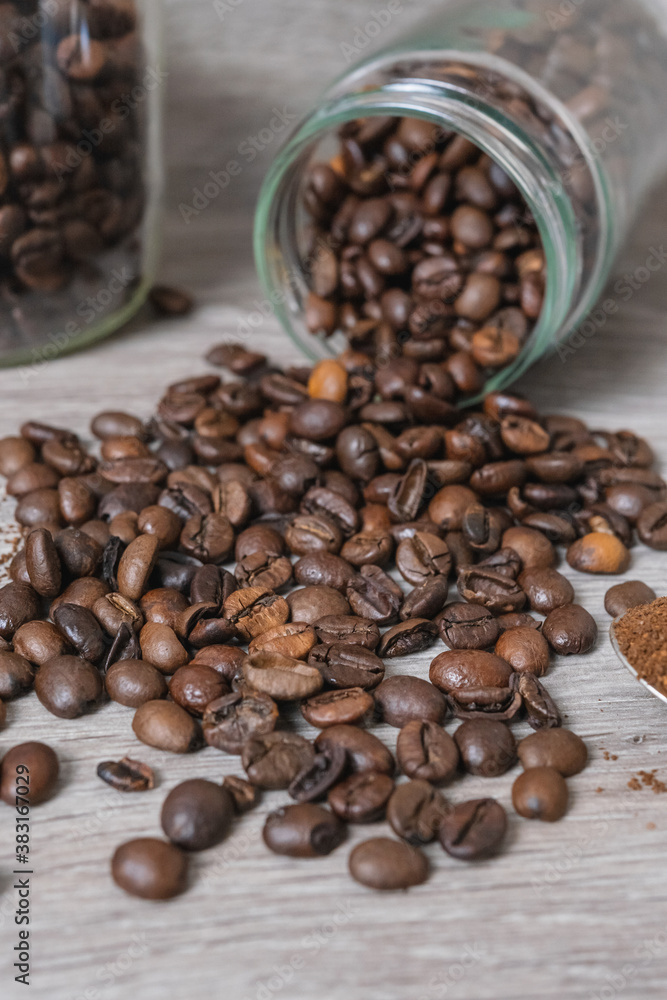 Fototapeta premium a cup on the table with coffee beans