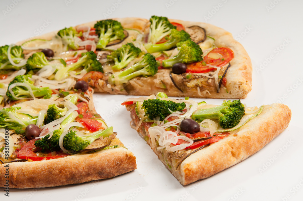 Slice Vegetarian Pizza, with tomato sauce, broccoli, tomatoes, zucchini, eggplant and onion rings