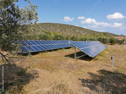 ermioni greece solar panel photovoltaic electricity array in olive grove