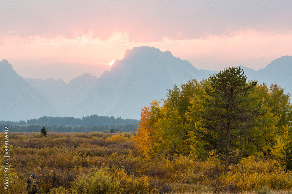 Landscape view of a beautiful sunset in Grand Teton National Park as seen from Willow Flats Overlook.