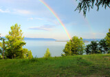 Summer landscape panorama with rainbow over lake Baikal   