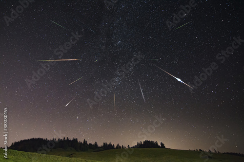 Perseid meteor shower with farm building