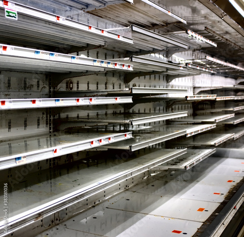 Empty Shelves at a Store About to Go Out of Business