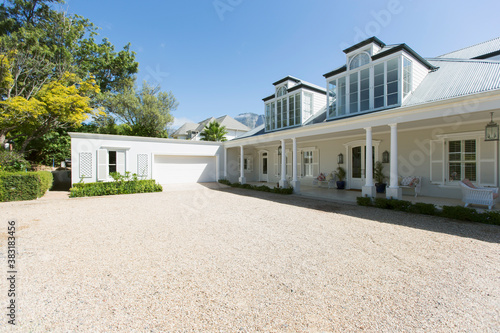 Tableau sur toile Sunny luxury modern home showcase exterior and driveway