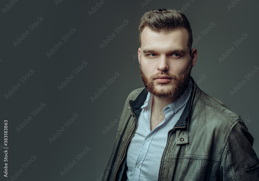 Obraz premium Sexy man isolated on grey background isolated. Fashion male model.