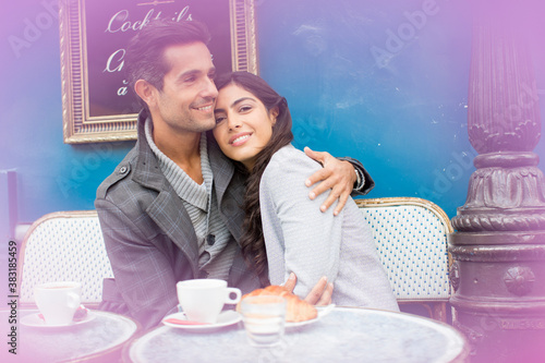 Canvas Print Portrait affectionate couple enjoying coffee at sidewalk cafe, Paris
