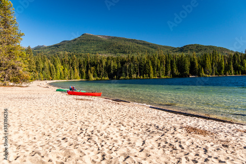 Bild auf Leinwand Red Canoe At Priest Lake, Idaho.