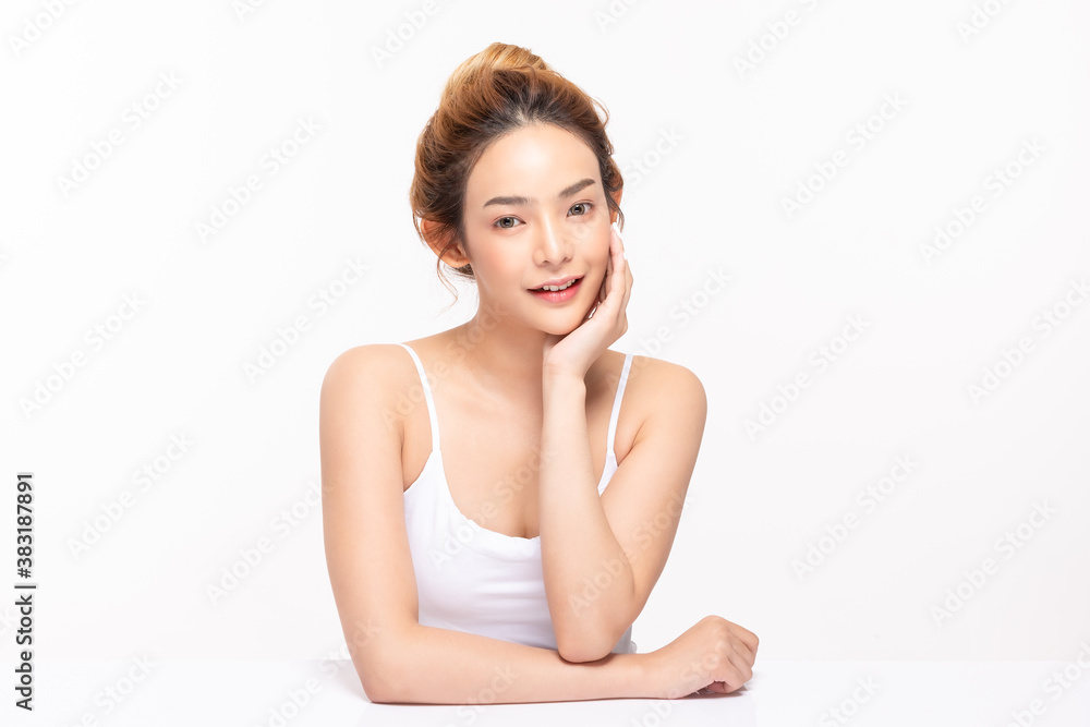 Beautiful Asian young woman touching soft cheek smile with clean fresh skin Happiness and cheerful with positive emotional,isolated on white background,Beauty Cosmetics and Facial treatment Concept Beautiful Asian young woman touching soft cheek smile with clean fresh skin Happiness and cheerful with positive emotional,isolated on white background,Beauty Cosmetics and Facial treatment Concept