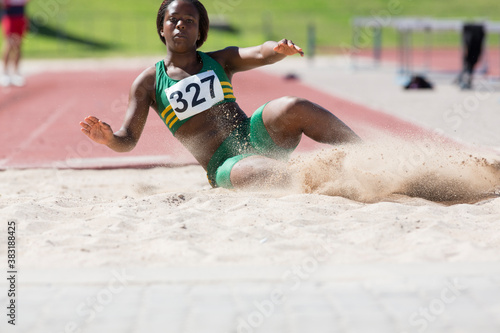 Φωτογραφία Female athlete long jumping