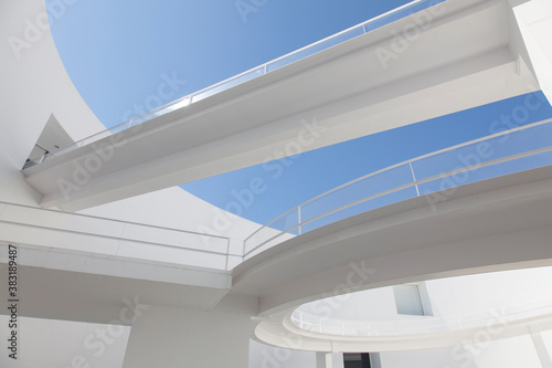 Elevated walkways in sunny modern courtyard